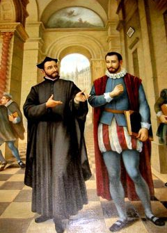 Saint Ignatius giving the book of The Spiritual Exercises to Saint Francis Xavier.